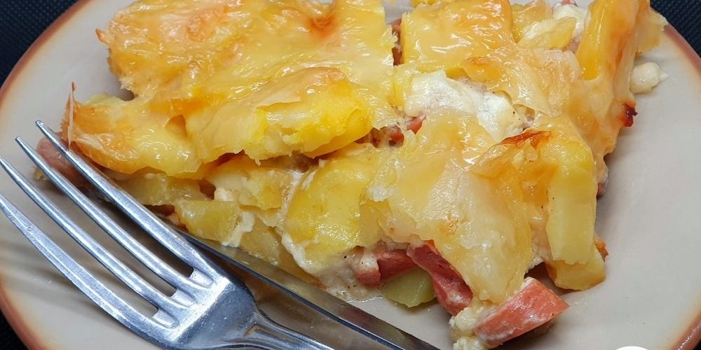 Gratin de pommes de terre mini saucisses et raclette